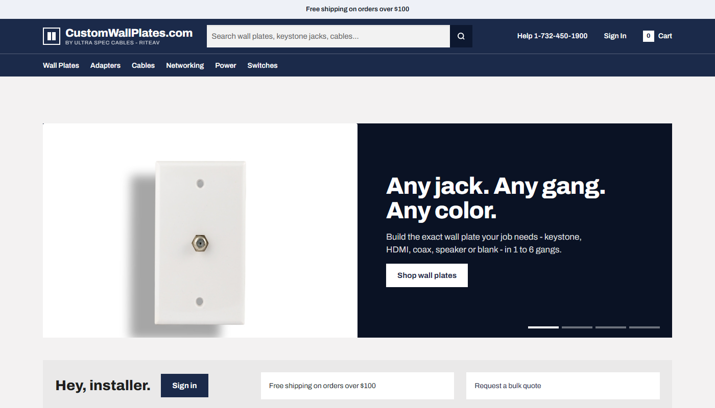 CustomWallPlates.com store home page with navy header and wall plate hero banner